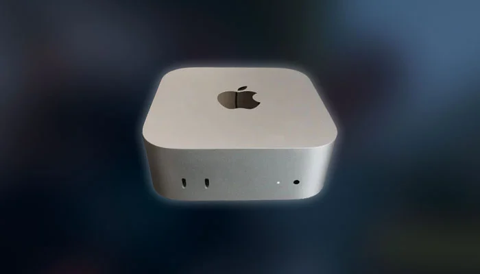 Mac Mini M4 em estúdio de fotografia com câmera e monitor para edição de fotos