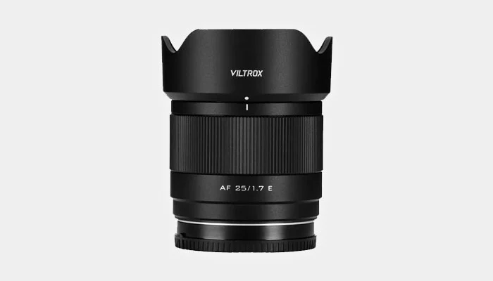 sensor recortado, baioneta de metal, motor de passo, aberração cromática, distância mínima de foco, fotografia de rua.